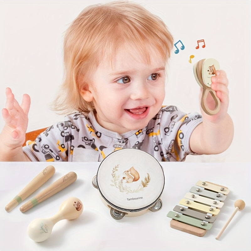 Close-up of child holding a small wooden music shaker from the toddler rhythm kit.