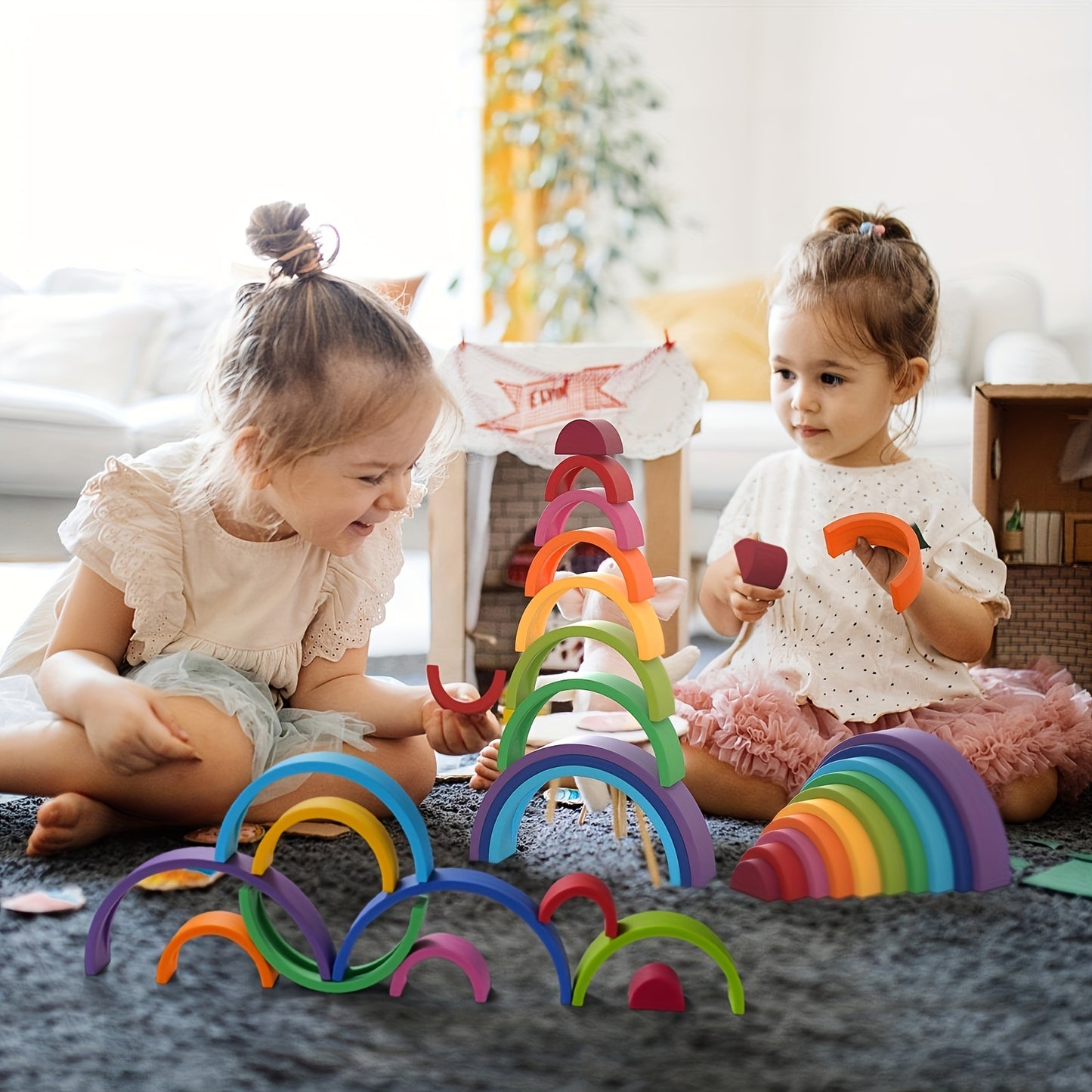 Child stacking vibrant rainbow arches to develop color recognition and spatial awareness