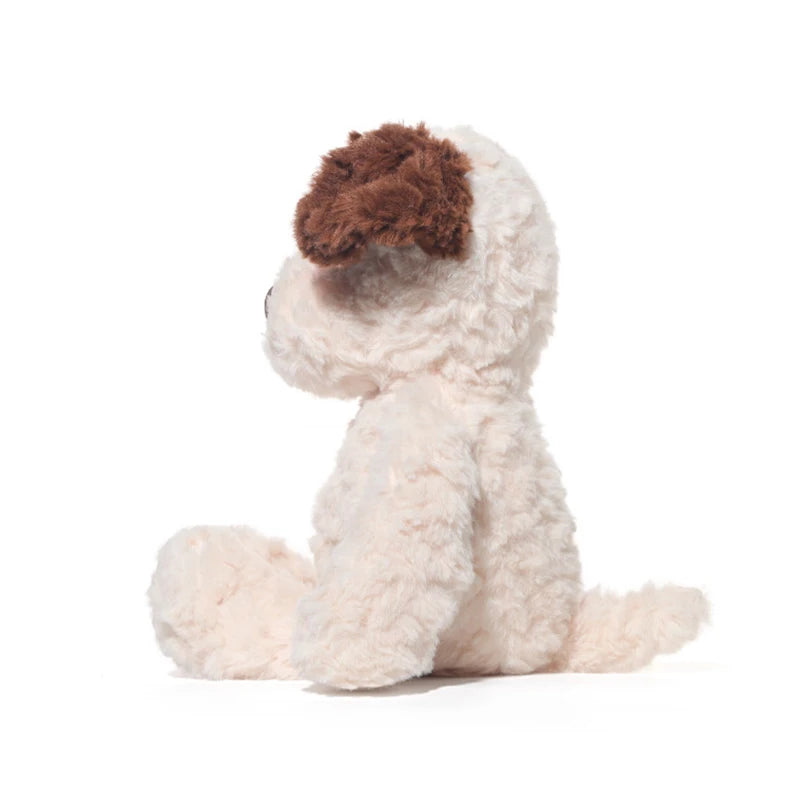 Plush toy dog with brown ears on a white background
