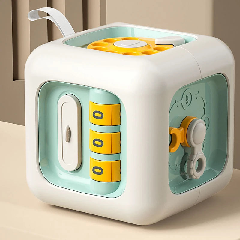 Montessori busy cube with six toddler and baby friendly activities