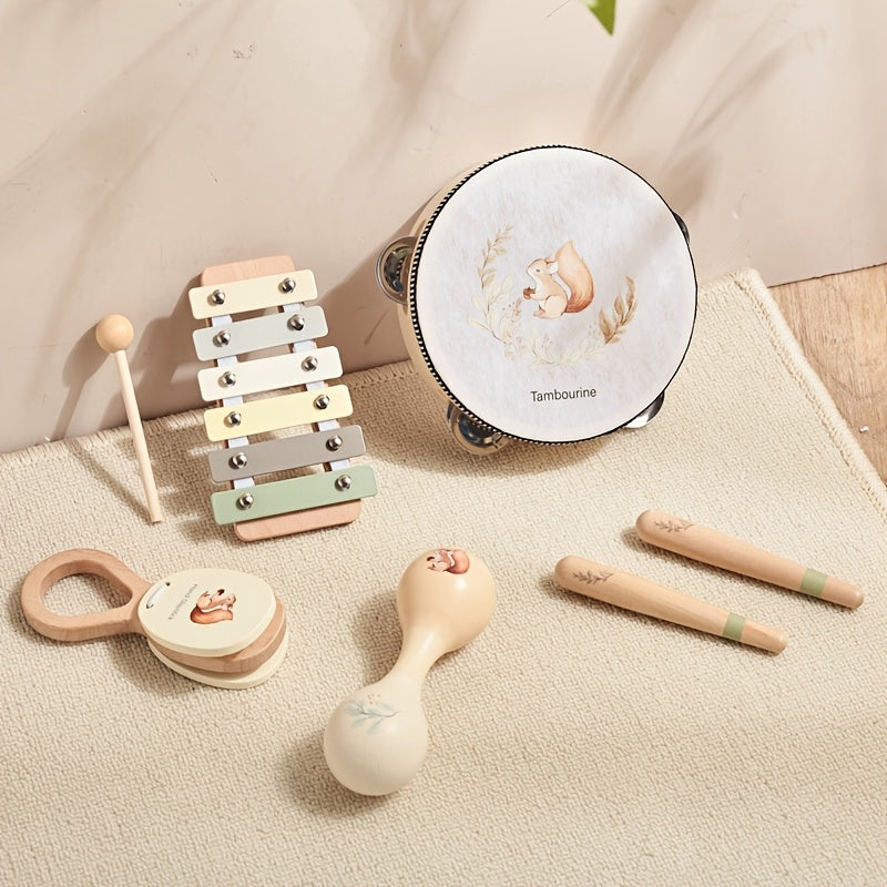 Small musical instrument set for toddlers with shakers, bells, and tambourine.