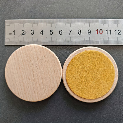 Size of Montessori-inspired sensory kit with seven wooden textured pieces for tactile stimulation in babies.