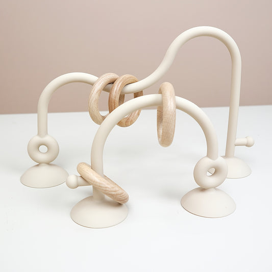 White silicone baby maze toy with suction base for safe infant play and motor development