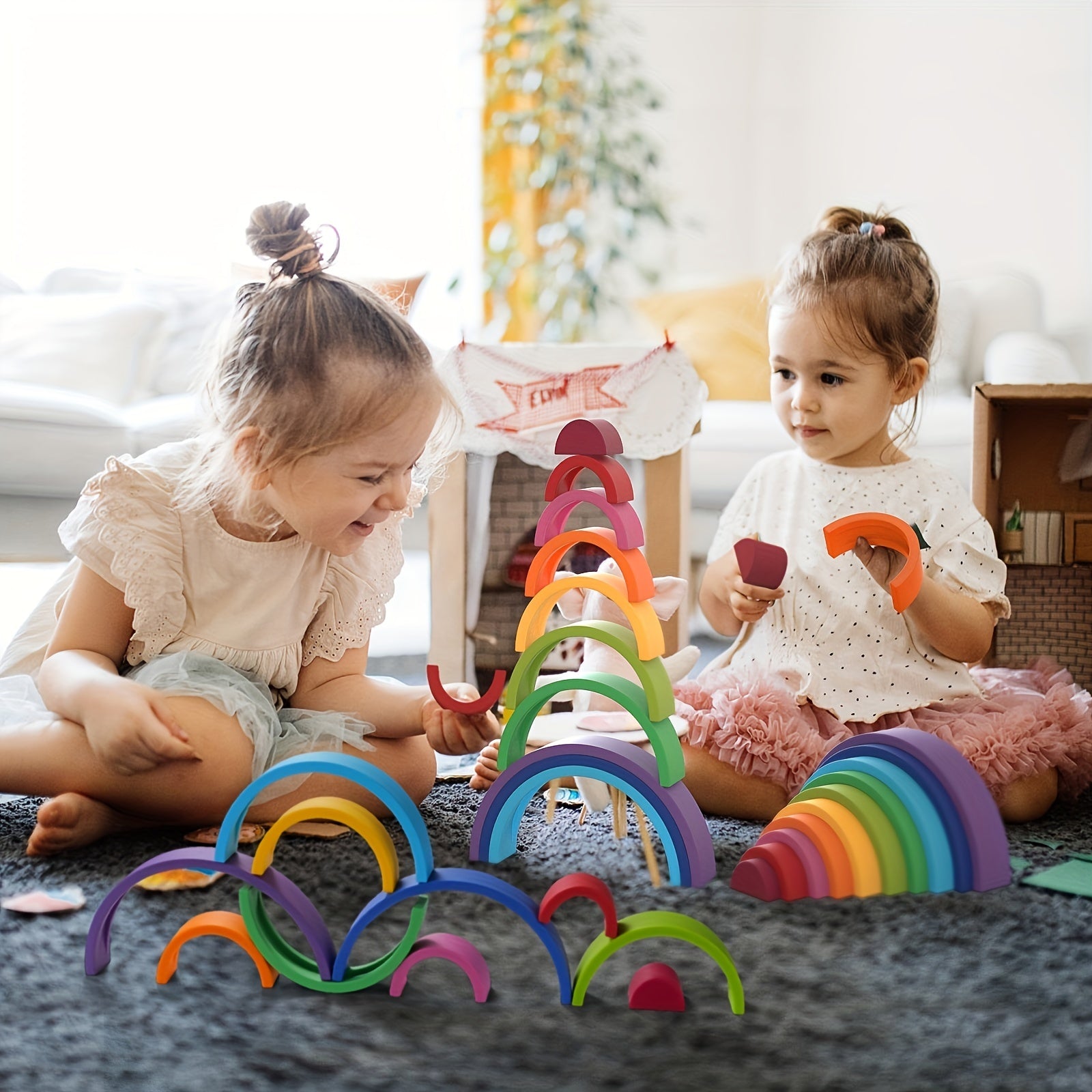 Child stacking vibrant rainbow arches to develop color recognition and spatial awareness