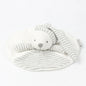 Striped plush toy with a soft texture on a white background