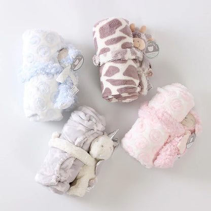 Four baby blankets with different patterns on a white background