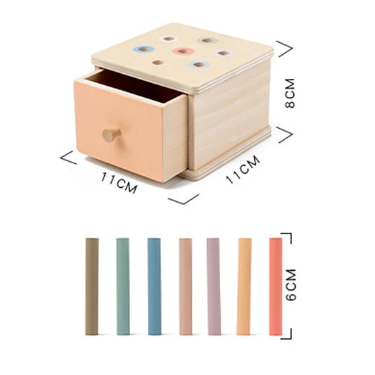 Montessori slot box wooden toy with colorful tubes for toddlers.