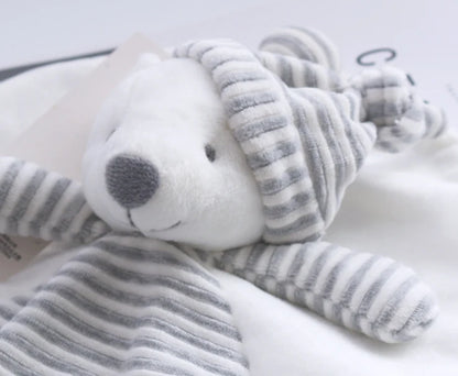 Plush toy with striped pattern on a white background