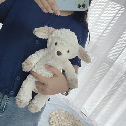 Person holding a white plush dog toy in front of a window with white curtains.