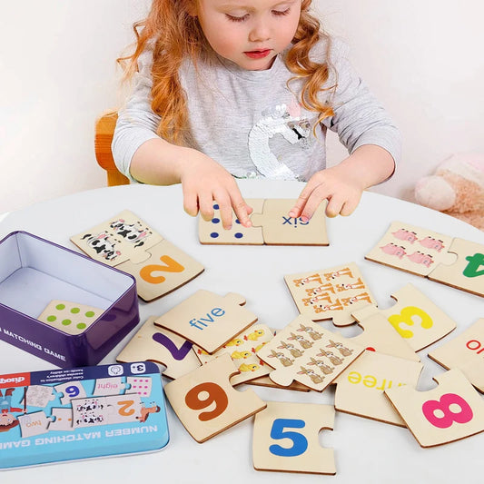 Child matching wooden puzzle pieces with numbers and colors for early learning