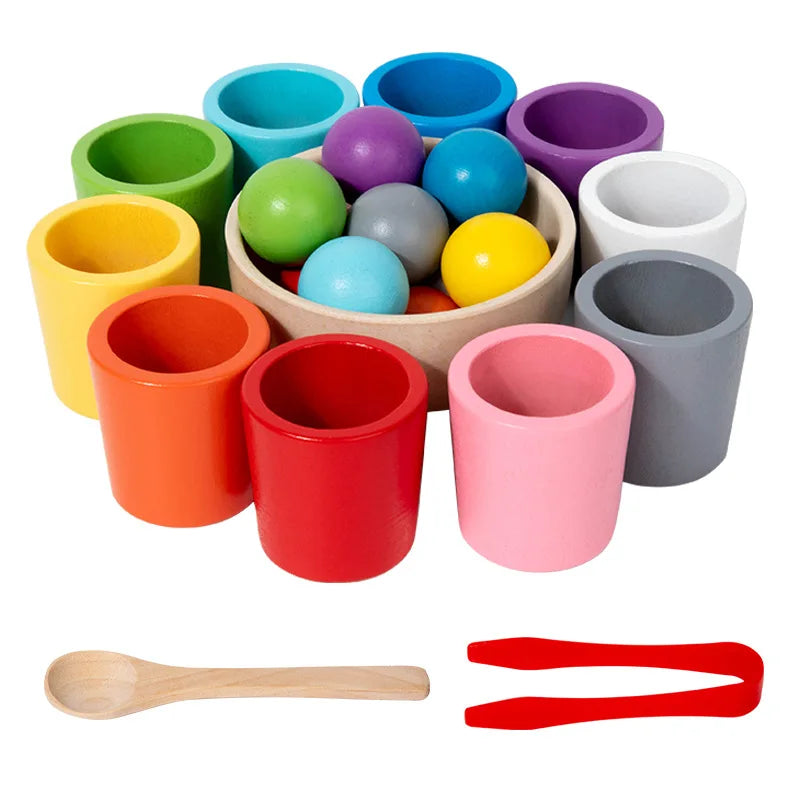 Montessori balls in cups set with wooden balls, color-coded cups, spoon, and tong for toddler fine motor and color matching play