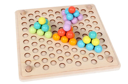 Close-up of wooden beads being clipped onto a Montessori activity board