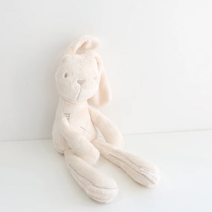 White plush bunny toy on a white background