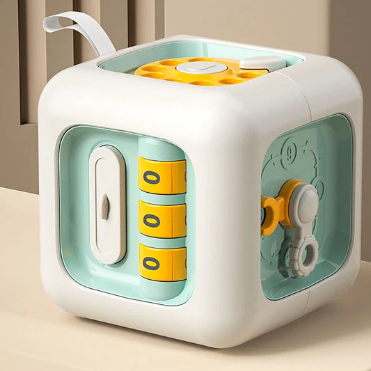 Montessori busy cube with six toddler and baby friendly activities