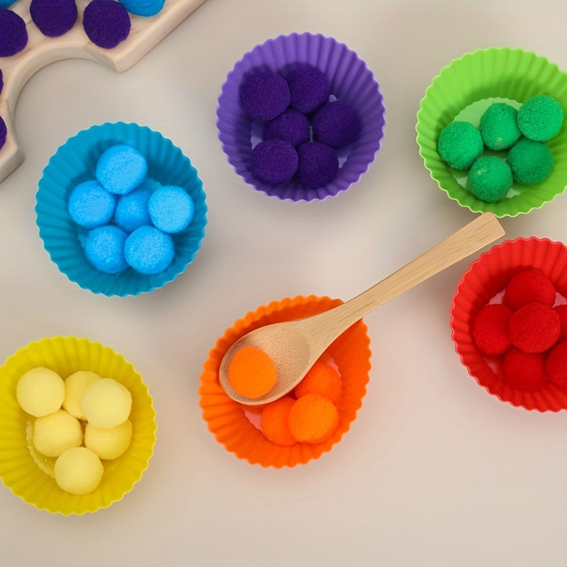Toddler practicing fine motor skills with spoon and pompom sorting game.