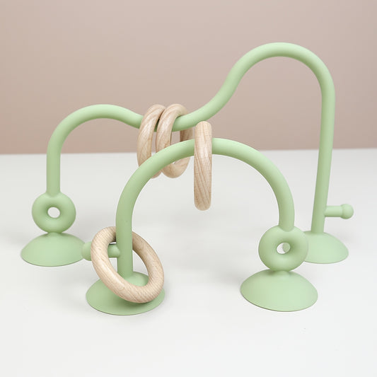 Montessori-inspired mint green maze toy with suction for hands-on baby play