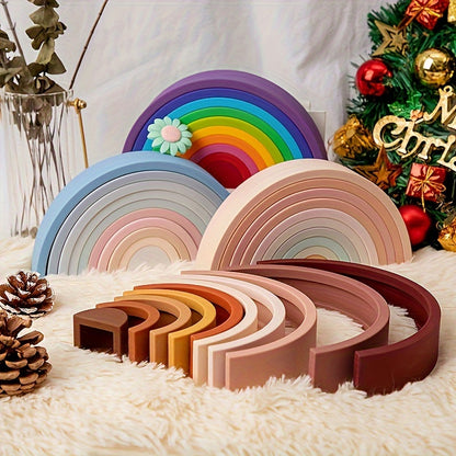 Wooden stacking rainbow toy with colorful arches arranged in a tower.